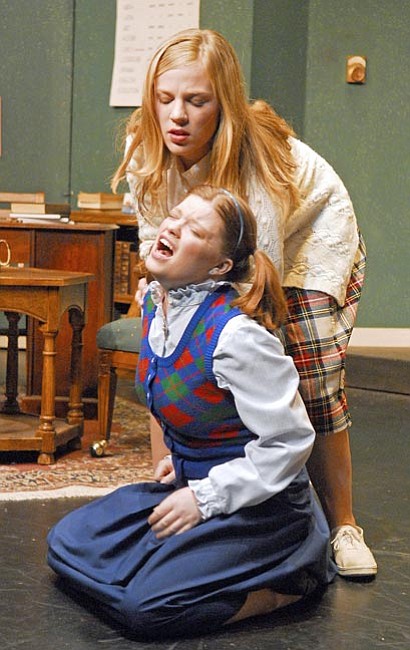 The Daily Courier/Matt Hinshaw<br>
Mary Tillford, played by Briana Polland, yanks the hair of Peggy, played by Crystal Hallenbeck during the dress rehearsal of “Children’s Hour” at the Prescott Fine Arts Association in downtown Prescott on Monday night.  “Children’s Hour” opens this Thursday, January 17 at 7:30pm.