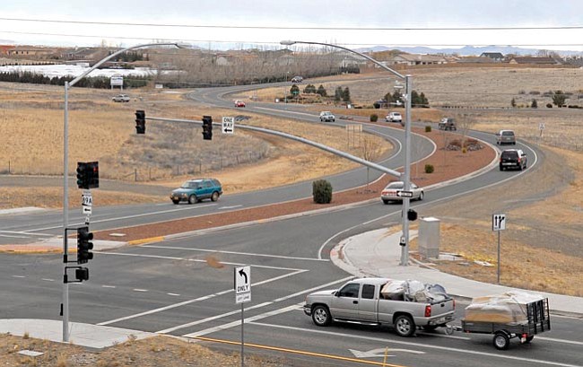 The Daily Courier/Matt Hinshaw<br>
Drivers pass through the intersection of 89A and Viewpoint Drive Friday afternoon in Prescott Valley.  Viewpoint Drive is the only way to access the subdivision north of Highway 89A.