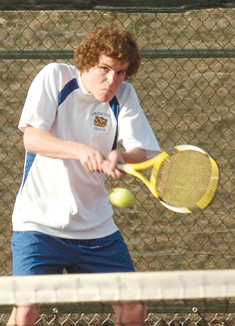 The Daily Courier/<br>Jo. L. Keener<br>Keith Williams was one of Prescott’s winners in singles play on Thursday at home against O’Connor.