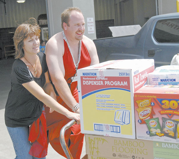 Male Costco employee wears dress for charity The Daily Courier