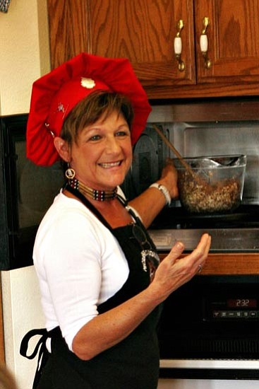 Courtesy<br>
Dee Dee Czarnowski reveals microwave-cooking tips on her AZTV morning show. 
