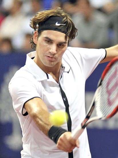 Georgios Kefalas/<br>The Associated Press<br>For all his accomplishments, Switzerland’s Roger Federer, seen at the Davidoff Swiss Indoors tournament in Switzerland on Thursday, hasn’t been able to pull off the Slam.