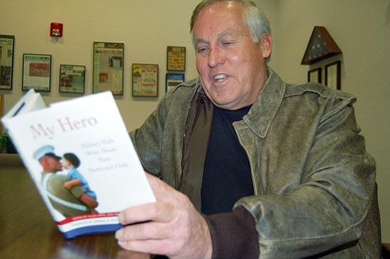 Bruce Colbert/The Daily Courier
Prescott resident Mike Rothmiller co-edited a book of children’s essays titled, “My Hero. Military Kids Write About Their Moms and Dads.” The essays alternate between funny and sad and the book includes artwork. It is available through Internet book sites.