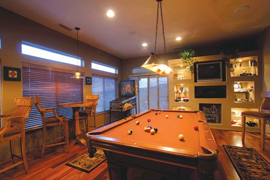Courtesy<p>
This game room was created for a Prescott homeowner from an existing 23’ by 17’ room to house a pool table, pinball machine, game table and large flat-screen television set.