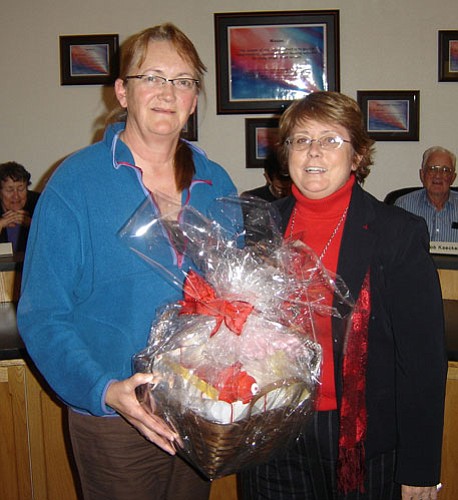 Courtesy photo<br /><br /><!-- 1upcrlf2 -->Heritage Middle School’s seventh grade science teacher, Anne Verner, (left) is Chino Valley Unified School District’s Teacher of the Second Quarter. Standing beside her is Penny Hubble, (right) the award’s sponsor. Verner holds the basket of goods she received as part of the award.<br /><br /><!-- 1upcrlf2 --><br /><br /><!-- 1upcrlf2 -->