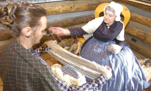Nathaniel Kastelic/The Daily Courier<br>
Deana Jordan and Glenna Hoff, living historians, prepare yarn for knitting in the Ranch House at Sharlot Hall Museum in this Jan. 20, 2007 file photo. Sharlot Hall Museum is one of many local entities sure to feel the state’s budget cuts.