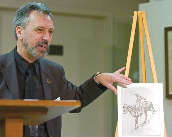 Matt Hinshaw/The Daily Courier<br>
Dr. John Langellier lectures Saturday afternoon about Buffalo Soldiers at the Phippen Museum.
