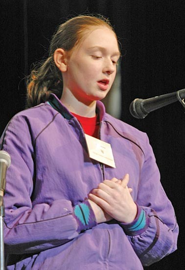 Courtesy/Heidi Dahms Foster<p>
Kelly Johnson, a Chino Valley eighth-grader from the Heritage Christian Home Educators group, spells a word on her way to the Yavapai County Spelling Bee championship Wednesday in Prescott Valley. Sponsor M&I Bank awarded her the plaque and a $100 savings bond.