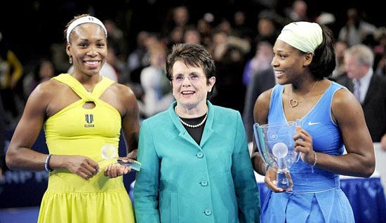 Stephen Chernin/<br>The Associated Press<br>Billie Jean King finds herself book-ended by the next generation of female tennis stars – Venus Williams, left, and Serena Williams, right – at the Billie Jean King Cup tennis exhibition Monday in New York.