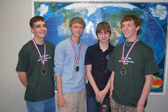Jerry J. Herrmann/The Daily Courier<br>
Four members of the Chino Valley High School Honors World History are hoping they can raise $4,000 so they can compete in the National History Day national competition at the University of Maryland on June 14. The boys’ two history day projects have advanced through the regional and state competitions and now hope to compete in the national finals. The boys are, from left, David Ridlen, Jonathan Argyle, Chris Cheff and Sage Miller.