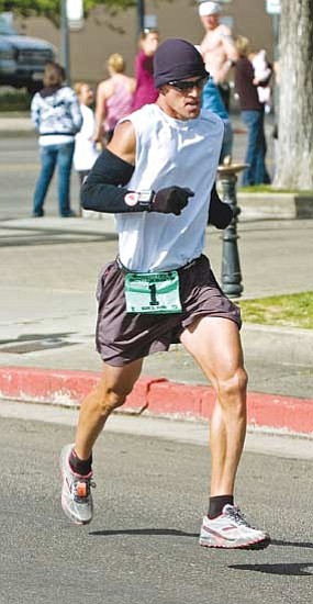 Matt Hinshaw/<br>The Daily Courier<br>Male marathon winner Dan Kuch of Lake Havasu defended his win last year at Whiskey Row by beating the field again on Saturday with a winning time of 2:54.25.