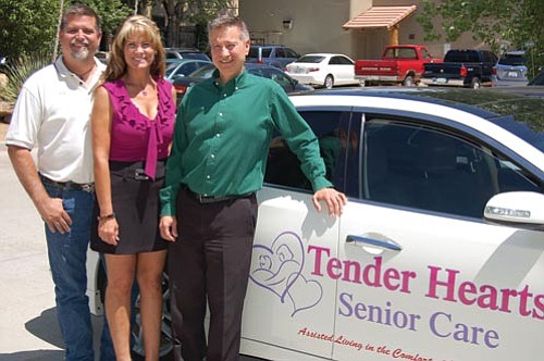 Jason Soifer/The Daily Courier<p>
Rick and Debbie Judy, owners of Tender Hearts Senior Care, stand with Al Carlow (right), president/founder of Tender Hearts Elder Care Advisory Services, outside their offices Wednesday.