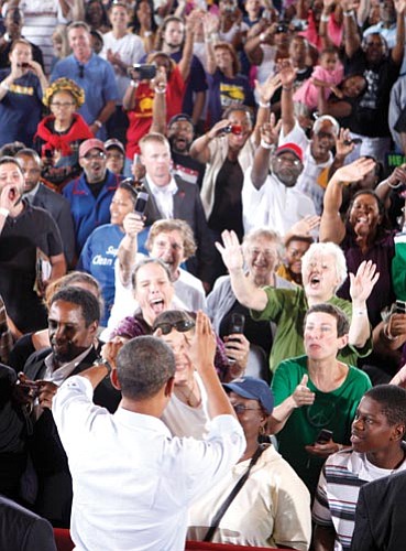 Charles Dharapak/The Associated Press<br>
President Barack Obama greets union members and their families after he spoke at the AFL-CIO Labor Day picnic at Coney Island in Cincinnati on Monday.