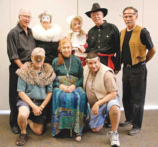 Karen Despain/<br>The Daily Courier<br>Playwright and director Robert Wiltsey, back row left, stands with characters in Custer and Friends, back row, from left, Elaine Jordan, Grace Lemmon, Chuck Post and Robert Dittberner, and front row, from left, Bill Haas, Bunny Sherman and Alex Gabaldon, during a rehearsal for the play, which will be Sunday at the Prescott Public Library.
