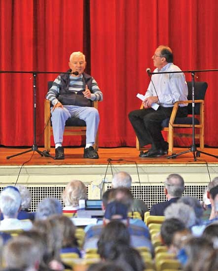 Matt Hinshaw/The Daily Courier<p>
Gary Gift, right, interviews Bob Ketcham, a World War II veteran, about his experiences during the Battle of the Bulge Tuesday afternoon at the Prescott Mile High Middle School's Veterans Assembly in Prescott.
