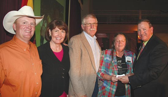 Courtesy photo<p>
Rep. Ann Kirkpatrick and other Farm Bureau officials presented awards to Orme Ranch managers Alan and Diana Kessler.

