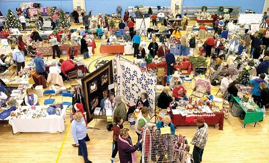 Matt Hinshaw/The Daily Courier<p>
Shoppers make their way around the Last-Minute Non-Profit Stocking Stuffer Bazaar at the Prescott Activity Center in December 2008. Non-Profit groups sell their wares to generate money for their groups.

