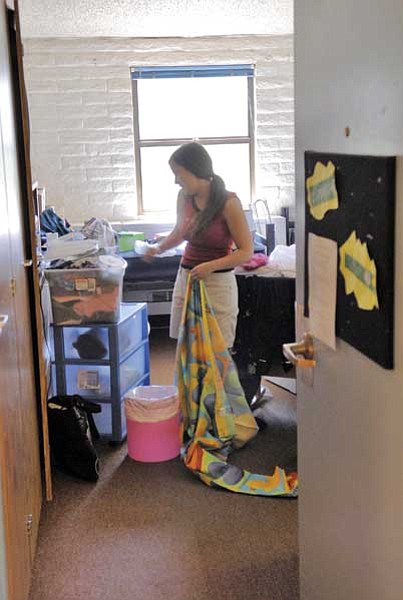 File photo/The Daily Courier<br>
Stephanie Scarim of Cottonwood moves into her Maripai Hall dorm at Yavapai College in August 2008. Students share tight rooms and very little closet space.