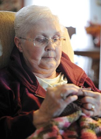 Les Stukenberg/The Daily Courier
Judy Slames, director of the new Ovarian Cancer Support Group, knits in her Prescott Valley home.
