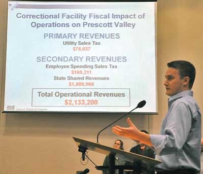 Matt Hinshaw/<br>The Daily Courier<br>Danny Court an Economic Analyst with Elliot D. Pollack and Co. presents his companies findings to the Prescott Valley City Council on the economic impact a private prison would have on the town Thursday night during a Town Council meeting in Prescott Valley. <br/>