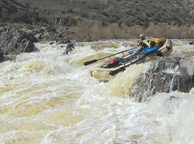 Courtesy U.S. Forest Service<br/>A rafter navigates the Verde Falls southeast of Camp Verde in 2008 when the Verde River was flowing at about 2,000 cfs.