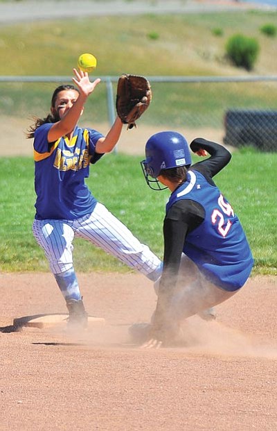 Matt Hinshaw/The Daily Courier<br />Mayer’s Jessica Adame, right, slides into second base as  <br />Joseph City’s Shealynn Hill awaits the throw at MHS on Friday.<br />Joseph City won 24-1.<br /><br /><br />
