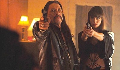 Courtesy photo<br /><br /><!-- 1upcrlf2 -->Danny Trejo and a femme fatale mean business in “Shoot the Hero.”