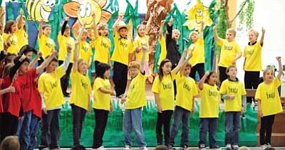 Les Stukenberg/The Daily Courier<br>Third graders at Abia Judd Elementary School in Prescott perform the play "Bugz" for students, teachers, family and friends. The performance held in the multi-purpose room was a standing room only event.