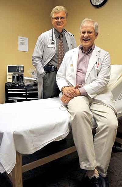 Matt Hinshaw/The Daily Courier<p>William Dabney, M.D., and Frank Nagy, M.D., well-known former family practitioners, recently joined UCR Health Centers’ urgent care complex on Willow Creek Road in Prescott. 
 

