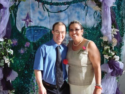 Courtesy photo<br>
Frank Brown and Michelle Stacy pose for a portrait at SNAP’s prom May 15.