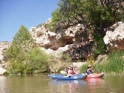 Joanna Dodder/The Daily Courier<br>
Sedona Adventure Tours’ “Water to Wine” tour participants enjoy floating the Verde River below Cottonwood on inflatable kayaks or “funyaks” on Memorial Day Weekend.
