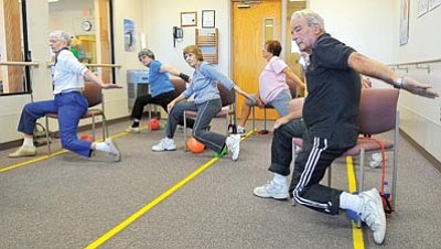 Matt Hinshaw/The Daily Courier<br>
Members of the SilverSneaker Fitness Program exercise Tuesday at Yavapai Regional Medical Center’s Del E. Webb Outpatient Center in Prescott Valley.
