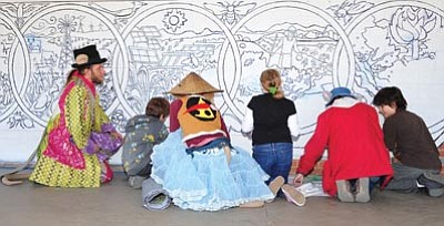 Les Stukenberg/The Daily Courier, file photo<br>
Students from Miller Valley Elementary School, with instruction from the Mural Mice, begin to grid draw for the large mural on the east side of the school this past April.