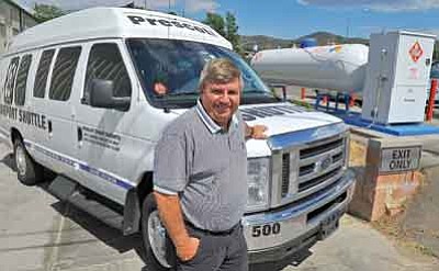 Matt Hinshaw/The Daily Courier<br /><br /><!-- 1upcrlf2 -->Steve Silvernale, CEO of the Prescott Transit Authority, stands next to a van converted to propane and the propane filling station Tuesday afternoon in Prescott. Currently, the Prescott Transit Authority has two vans that have been converted to propane in its fleet and are hoping to convert more in the future.<br /><br /><!-- 1upcrlf2 -->
