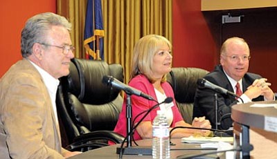 Brett Soldwedel/The Daily Courier<br>
Noel Campbell, left, Karen Fann and Andy Tobin, all House of Representative candidates, are all smiles before a debate in Prescott City Hall Thursday.