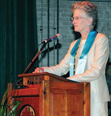 Brett Soldwedel/The Daily Courier<br>
Dr. Kristen Woolever, Prescott College’s new president, gives her inauguration speech at the Elks Opera House on Friday.