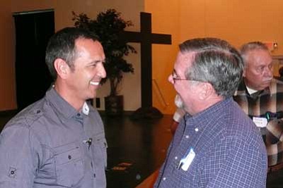 Courtesy photo<BR>
Pastor Kenny Luck of California-based Every Man Ministries, left, converses with former Prescott Mayor Rowle Simmons during an all-men’s conference he sponsored at the Adult Center of Prescott in March.
