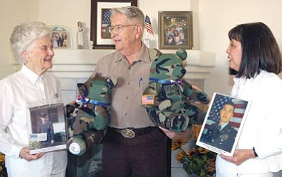 Cheryl Hartz/Courtesy photo<br>Chuck Leon presents Fallen Warrior Bears to left, Penny Steele, and right, Jasmine Crowl, Gold Star Moms whose sons were killed in the line of military duty.