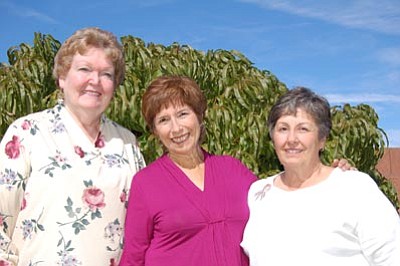 Doug Cook/The Daily Courier<br>Roma Morgan, Carol Ann Kearns and Joan Michelbrink of Prescott volunteer with the American Cancer Society’s “Reach to Recovery” program.
