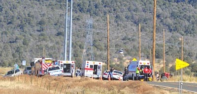 Les Stukenberg/The Daily Courier<br>
Emergency personnel respond to the scene of a one-vehicle rollover wreck at mile marker 331 on Highway 89A in Prescott Valley.