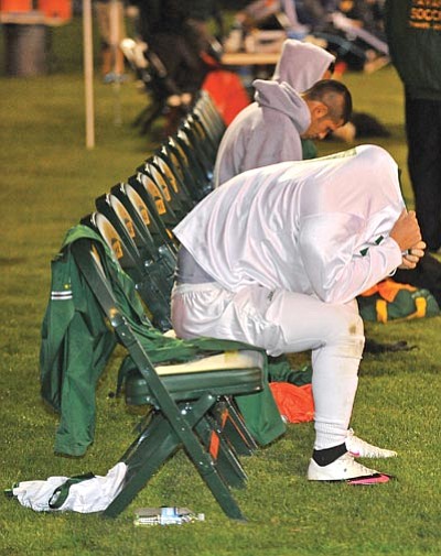 The Daily Courier<br /><br /><!-- 1upcrlf2 -->A Yavapai College soccer player hides his head after the Roughriders were eliminated from the NJCAA Region I, Division I playoffs in late October.