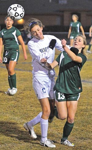 Matt Hinshaw/The Daily Courier<br /><br /><!-- 1upcrlf2 -->Prescott High’s Emily Schmuckler, left, and Flagstaff’s Janelle Metzger fight for the ball at PHS on Tuesday. Flagstaff won 4-0.
