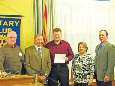 Courtesy photo<br>
Val Ripley (Prescott Sunup Rotary), Brian Sheldahl (Prescott Rotary), Jane Bristol (Prescott Frontier Rotary) and  Ron Finken (Prescott Frontier Rotary) present Prescott Unified School District Superintendent Dave Smucker (second from left) with a $7,500 check for PUSD’s reading program.