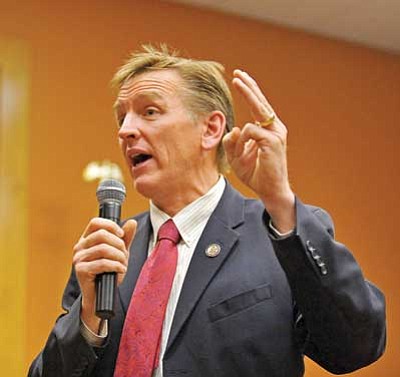 Matt Hinshaw/The Daily Courier<br>
Congressman Paul Gosar answers questions from the audience Monday night during a town hall meeting at Prescott City Hall.