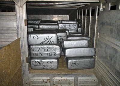 Department of Public Safety/Courtesy photo<br>
A DPS officer seized a record 4,535 pounds of marijuana last week when he stopped this cattle truck for an equipment violation as it headed east on Interstate 10 near Tucson.
