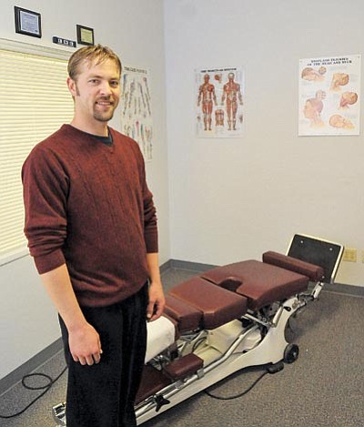 Matt Hinshaw/The Daily Courier<br>
Jed Zastrow, owner of Zastrow Family Chiropractic, opened his business Feb. 1 inside the Safeway shopping center on Willow Creek Road in Prescott.