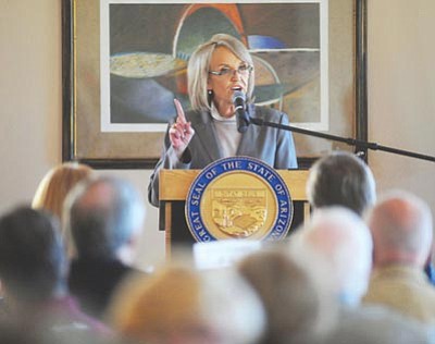 Les Stukenberg/The Daily Courier<br>
Governor Jan Brewer speaks at the Stoneridge Clubhouse in Prescott Valley on March 23.