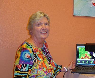 Courtesy of Carol Conti<br> Carol Conti, RT, CTT, of Northern Arizona Thermal Imaging displays a thermogram on her computer screen.