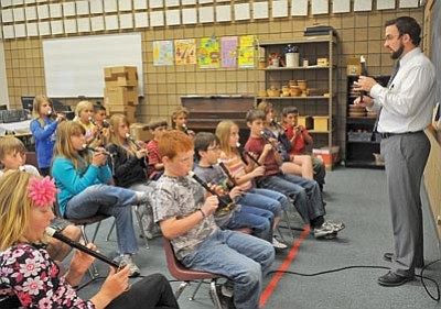 Matt Hinshaw/The Daily Courier<br>
Abia Judd music teacher Caleb Doyel was recently named the 2011 Yavapai County Outstanding First- Year Teacher.