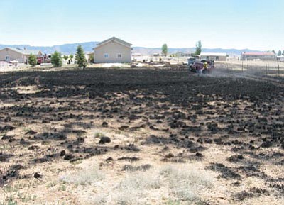 Courtesy photo<br>Reckless burning caused a fire that scorched land in Poquito Valley. 
